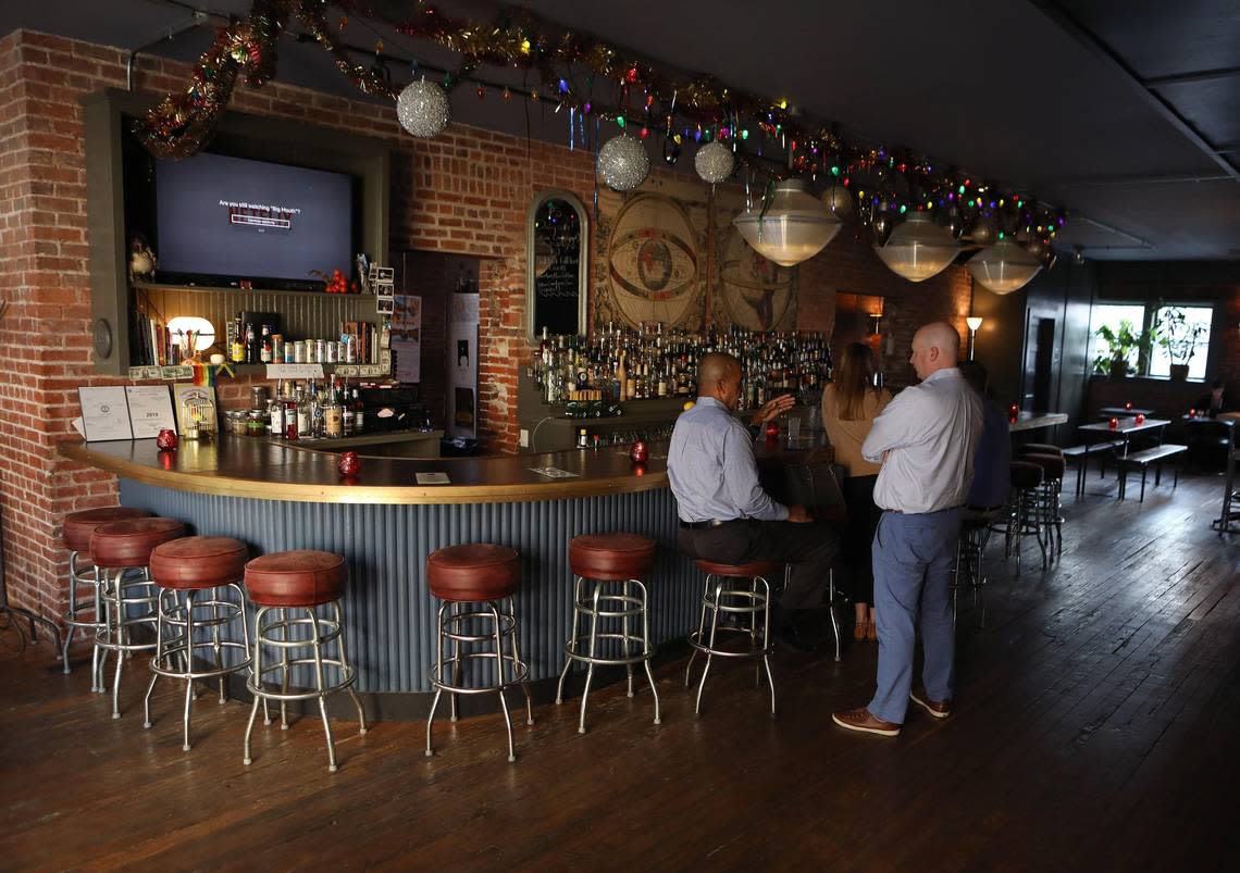 Customers mingling at the bar Wednesday evening at Bar Ona, located at 108 Church Street in Lexington. Matt Goins/Matt Goins