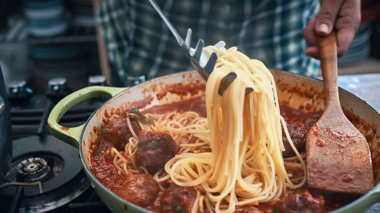 spaghetti and meatballs in pan
