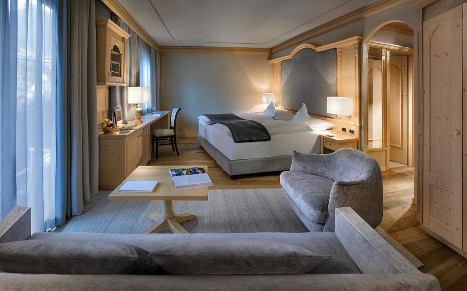 The rooms at Gardena Grodnerhof are spacious with a cosy, alpine feel (Fiorenzo Calosso)