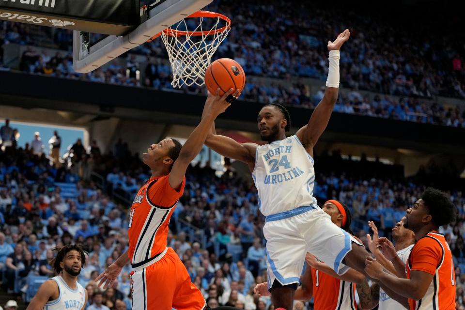 Jan 13, 2024; Chapel Hill, North Carolina, USA; Syracuse Orange guard Quadir Copeland (24) shoots as North Carolina Tar Heels forward Jae'Lyn Withers (24) defends in the first half at Dean E. Smith Center. Mandatory Credit: Bob Donnan-USA TODAY Sports