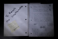 Taya Bruell's journal and a sticky note with a grade of A+ from her literature class teacher are photographed in Santa Barbara, Calif., Wednesday, March 9, 2022. Taya was assigned to keep the journal. In it, she drew a disturbing portrait that showed self-harm and wrote about how much she hated her body and was hearing voices she wanted to silence. Her teacher read the assignment and wrote: "Taya, very thorough journal. I loved reading the entries. A+" Three months later in February 2016, Taya killed herself. (AP Photo/Jae C. Hong)