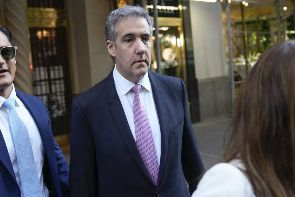 Michael Cohen leaves his apartment building on his way to Manhattan criminal court in New York, Monday, May 20, 2024. (AP Photo/Seth Wenig)