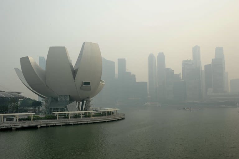 A general view shows Singapore skyline, shrouded by haze, on June 20, 2013. Local smog index hit the critical 400 level on Friday, making it potentially life-threatening to the ill and elderly people, according to a government monitoring site