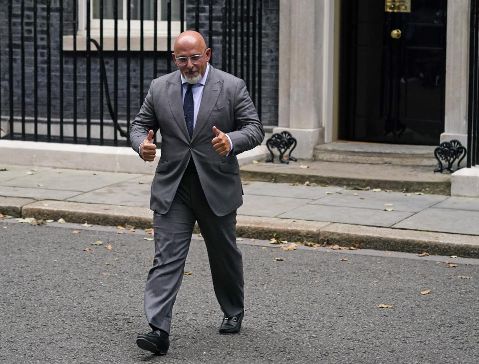 Britain's Business minister Nadhim Zahawi gestures as he leaves 10 Downing Street, in London, Wednesday, Sept. 15, 2021. British Prime Minister Boris Johnson is shaking up his Cabinet as he attempts to move on from a series of political missteps and U-turns. Johnson's office said he would appoint "a strong and united team to build back better from the pandemic." (AP Photo/Alberto Pezzali)