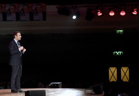 Emmanuel Macron, candidate in France's 2017 French presidential election, delivers an address for French nationals in London, Britain, February 21, 2017. REUTERS/Toby Melville