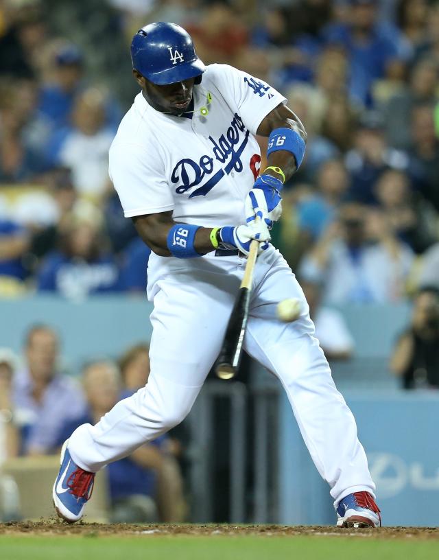 Puig gives a special Dodger fan the shirt off his back