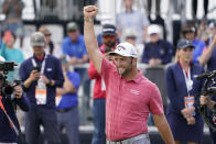 U.S. Open champion Jon Rahm, of Spain, walks across the 18th green after the final round of the U.S. Open Golf Championship, Sunday, June 20, 2021, at Torrey Pines Golf Course in San Diego. (AP Photo/Jae C. Hong)