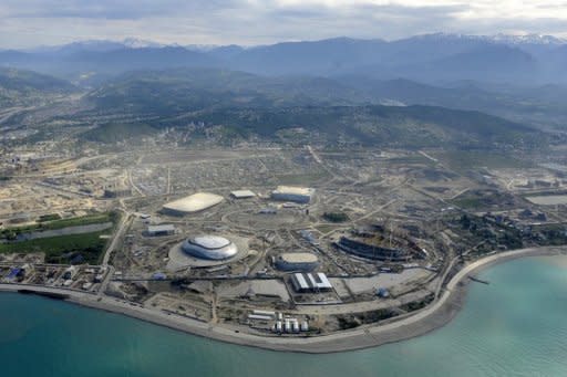 A helicopter view taken in May 2012 of construction underway at the Olympic Park in the Black Sea resort of Sochi. Russia on Wednesday set itself the "unbelievably" tough target of finishing top of the podium at its home Winter Olympic Games after placing a humiliating 11th two years ago