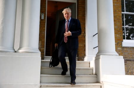 Former British Foreign Secretary Boris Johnson leaves his home in London