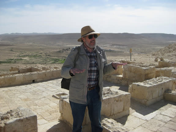 Hendrik Bruins showing off an ancient wine press in the ancient Nabataean city of Avdat. Techniques to harvest runoff and floodwaters allowed these people to grow vineyards in the desert.