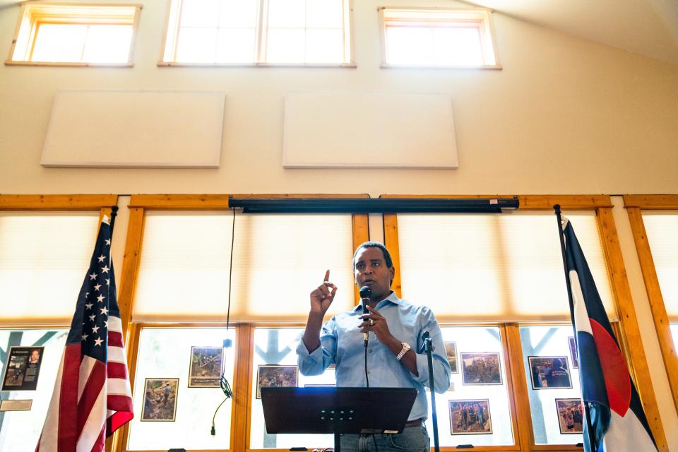 Rep. Joe Neguse speaks during a 2013 flood 10-year commemoration event at the Glen Haven Town Hall on Sept. 9, 2023. Dozens of people, including a full congressional delegation, attended.