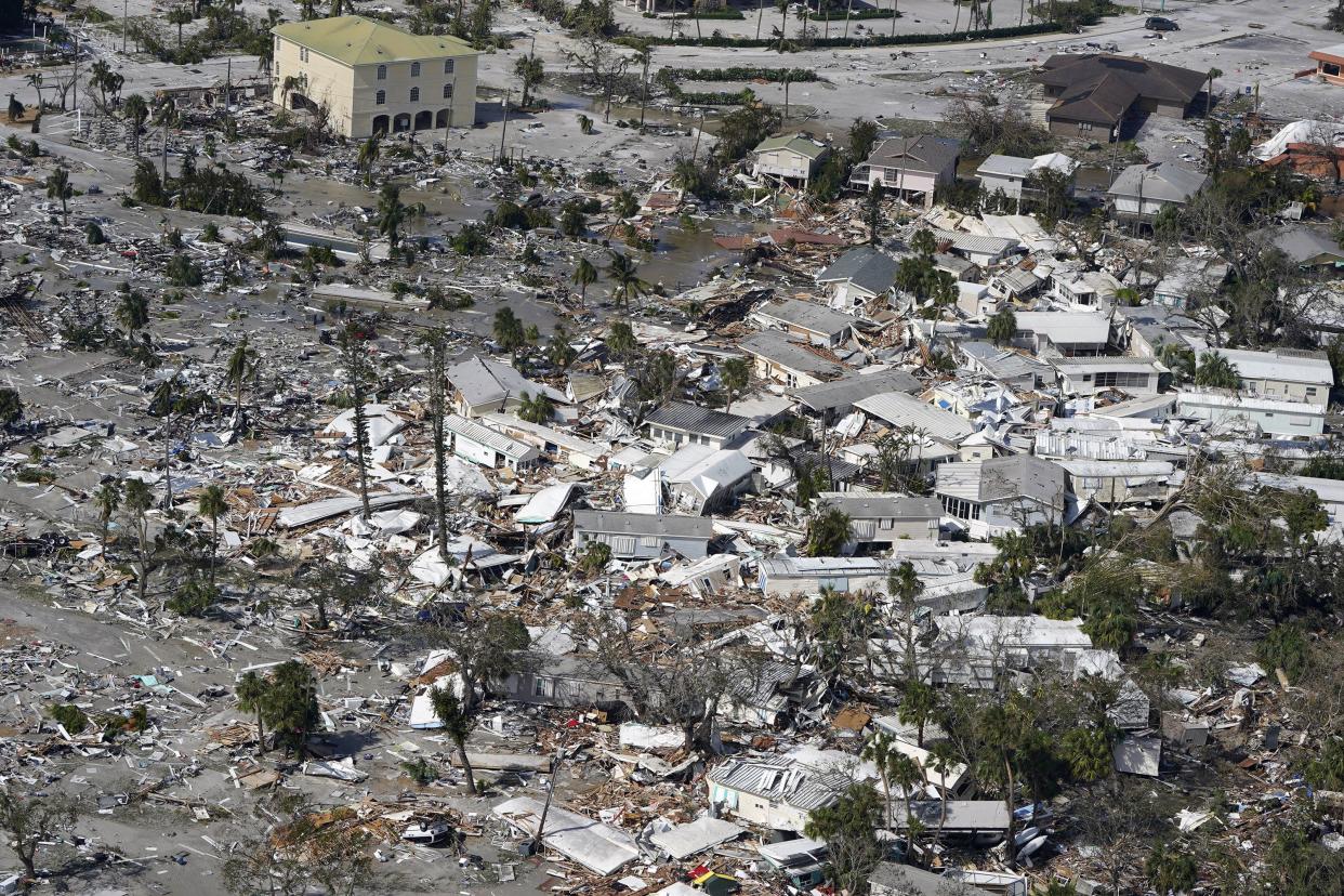 Damaged homes and debris are shown in the aftermath of Hurricane Ian, Thursday, Sept. 29, 2022, in Fort Myers, Fla.