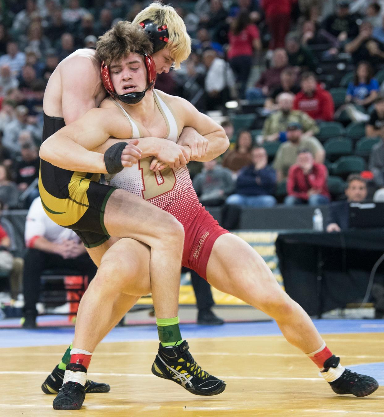 Delsea's Jared Schoppe, front, works to escape a hold from Brick Memorial's Harvey Ludington during the 175 lb. bout of the final round of the 2022 NJSIAA Wrestling Championships held at Boardwalk Hall in Atlantic City on Saturday, March 5, 2022.   Ludington defeated Schoppe, 5-2.