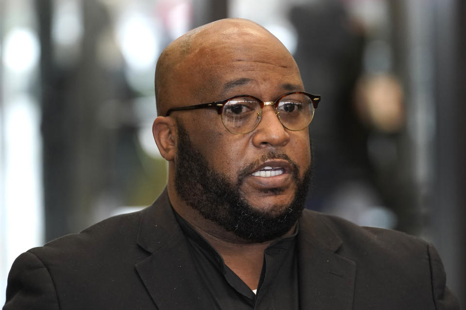 Pastor Damon Mack addresses reporters in the lobby of the Leighton Criminal Courthouse on behalf of actor Jussie Smollett Wednesday, Dec. 1, 2021, in Chicago. (AP Photo/Charles Rex Arbogast)