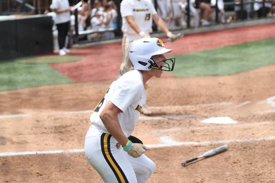 Missouri's Maddie Snider, a Rock Bridge alum, reacts after scoring a run against Missouri State during the opening game of the Columbia Regional on Friday at Mizzou Softball Stadium.