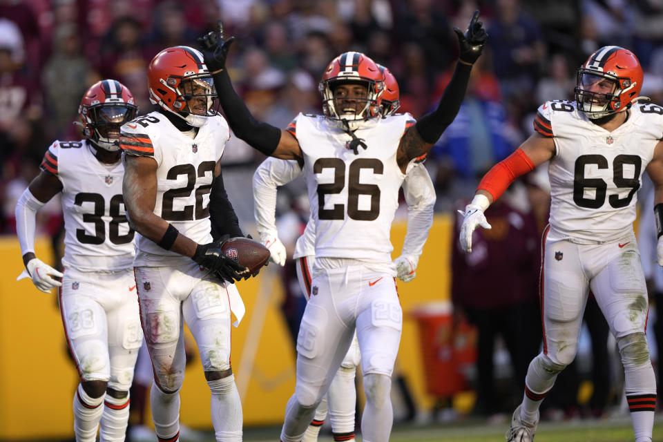 Cleveland Browns safety Grant Delpit (22) celebrates an interception with teammates during the second half of an NFL football game against the Washington Commanders, Sunday, Jan. 1, 2023, in Landover, Md. (AP Photo/Susan Walsh)