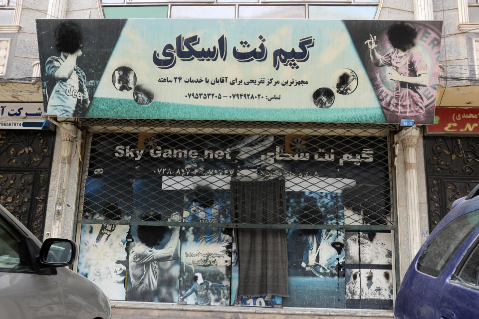 A view of Sky Game Net, after it was closed, in Herat province, western Afghanistan, Monday, April 10, 2023. The Taliban have banned families and women from restaurants with gardens or green spaces in Afghanistan's northwestern Herat province, an official said Monday. The moves followed complaints from religious scholars and members of the public about mixing of genders in such places, he said. (AP Photo/Omid Haqjoo)