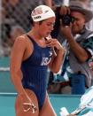 Janet Evans of the United States leaves the pool area after finishing 3rd in her women's 800 meters freestyle heat at the1996 Summer Olympics in Atlanta Wednesday July 24, 1996. (AP Photo/Doug Mills)