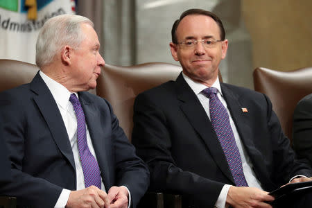 FILE PHOTO: U.S. Attorney General Jeff Sessions and Deputy Attorney General Rod Rosenstein participate in a National Opioid Summit at the Justice Department in Washington, U.S. October 25, 2018. REUTERS/Jonathan Ernst/File Photo