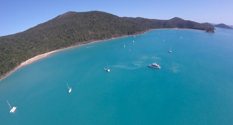 An areal shot of a CQ Rescue team attending to 2018 shark attack on the Whitsundays