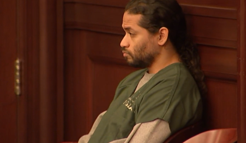 Mario Fernandez Saldana waits to be escorted out of the courtroom Wednesday after his hearing in the shooting death of Jared Bridegan in Jacksonville Beach.