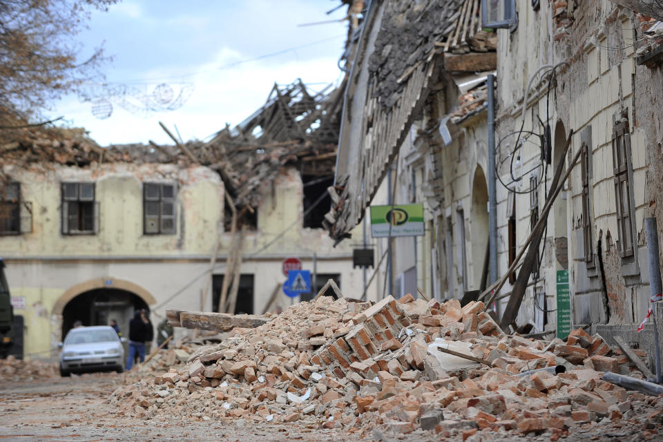 A view of buildings damaged in an earthquake in Petrinja, Croatia, Tuesday, Dec. 29, 2020.  A strong earthquake has hit central Croatia and caused major damage and at least one death and some 20 injuries in the town southeast of the capital Zagreb. (AP Photo)