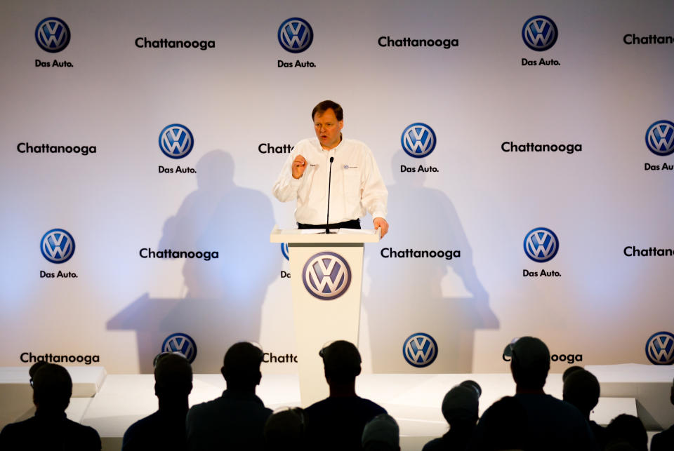 FILE - In this March 22, 2012 file photo, Frank Fischer, CEO and chairman of Volkswagen's operations in Chattanooga, Tenn., speaks to workers at the plant about the German automaker's announcement that it would add 800 new jobs by the end of the year. With a year of operation on the books, Volkswagen’s facility in Chattanooga is boosting employment and capacity to meet demand, moving up plans to export the vehicle to Asia and becoming a blueprint for the German automaker's future plants. (AP Photo/Erik Schelzig, File)