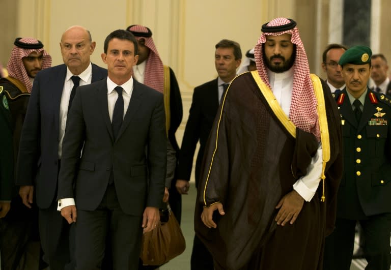 French Prime Minister Manuel Valls (L) and Saudi Defence Minister Mohammed bin Salman bin Abdul Aziz (R) arrive for a meeting in Riyadh on October 13, 2015