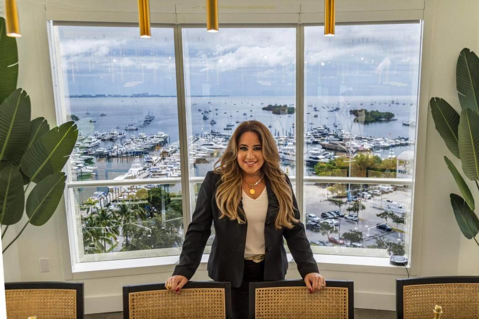 ‘There is no greater dream for me,” Lissette Calderon says, “than hopefully one day one of my daughters, if not all three, are somehow involved in this.’ Calderon, CEO of Neology Life Development Group, stands in the conference room of the firm’s new Coconut Grove office, on Friday, Oct. 20, 2023.