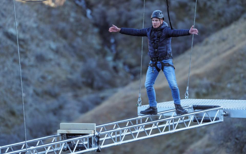 John Barrowman completed first challenge: crossing a 335ft canyon on two steel parallel bars