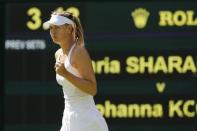 Maria Sharapova of Russia reacts against Johanna Konta of Britain at the Wimbledon Tennis Championships in London, June 29, 2015. REUTERS/Suzanne Plunkett