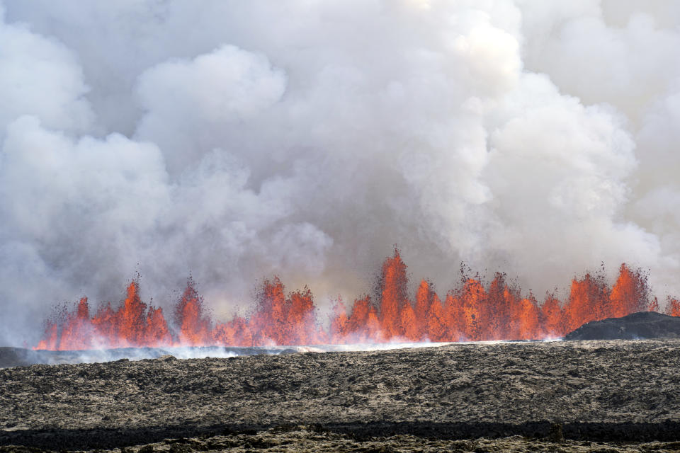 A volcano spews lava in Grindavik, Iceland, Wednesday, May 29, 204. Wednesday, May 29, 2024. A volcano in southwestern Iceland is erupting, spewing red streams of lava in its latest display of nature's power. A series of earthquakes before the eruption Wednesday triggered the evacuation of the popular Blue Lagoon geothermal spa. The eruption began in the early afternoon north of Grindavik, a coastal town of 3,800 people that was also evacuated. (AP Photo/Marco di Marco)