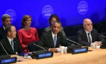 US President Barack Obama (C) speaks as Iraq's Prime Minister Haider al-Abadi (R) and United Nations Secretary General Ban Ki-moon (L) look on during the Leaders' Summit on Countering ISIL at the United Nations on September 29, 2015