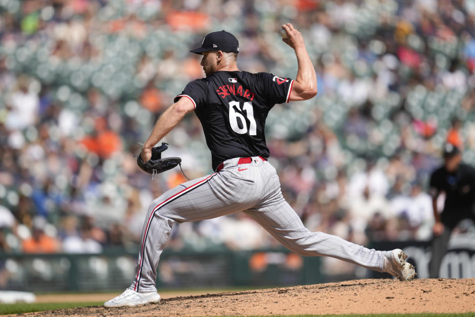 Minnesota Twins pitcher Brock Stewart (61) throws against the Detroit Tigers in the seventh inning of a baseball game, Sunday, April 14, 2024, in Detroit. (AP Photo/Paul Sancya)