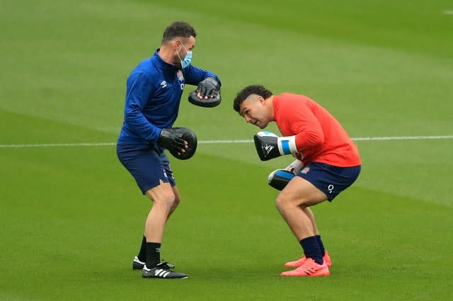 Genge does some boxing practice during England training at Twickenham