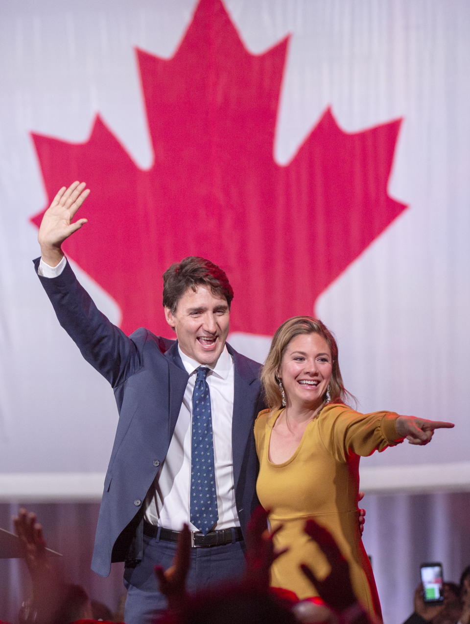 Liberal leader Justin Trudeau celebrates with his wife, Sophie Gregoire Trudeau, after winning a minority government at the election night headquarters Tuesday, Oct. 22, 2019 in Montreal. (Ryan Remiorz/The Canadian Press via AP)