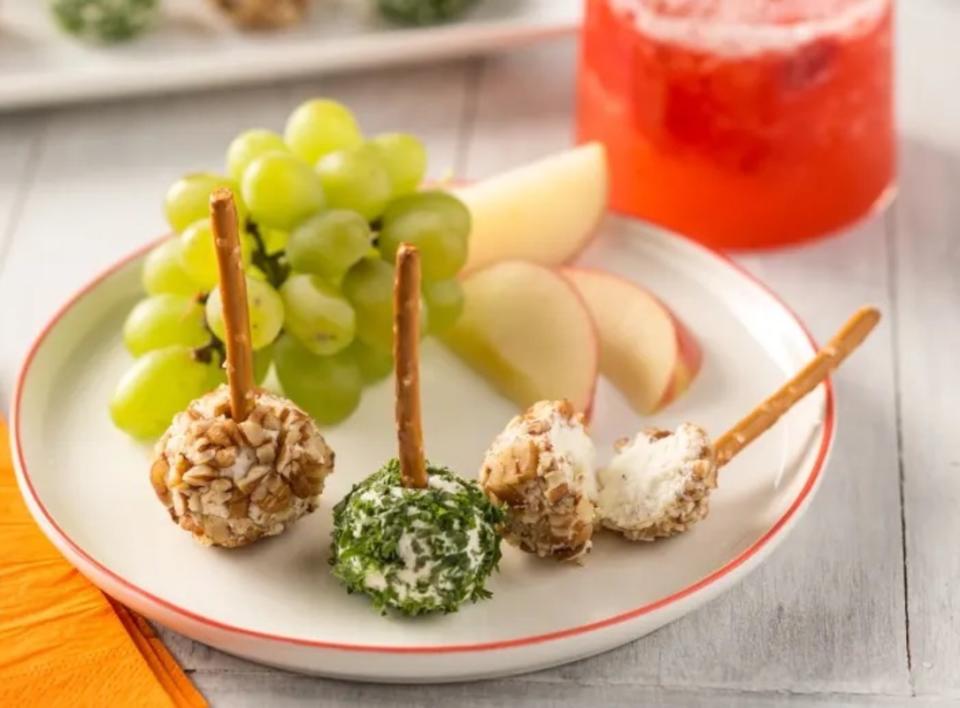 <p>Lisa Waddle</p><p>The choices and variations of these are endless with different nuts, herbs and dried fruit.</p><p><strong>Get the recipe: <a href="https://parade.com/841669/lisawaddle/cheese-ball-bites/" rel="nofollow noopener" target="_blank" data-ylk="slk:Cheeseball Bites;elm:context_link;itc:0;sec:content-canvas" class="link ">Cheeseball Bites</a></strong></p>