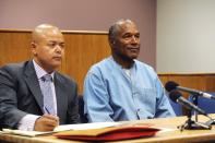 <p>O.J. Simpson (R) arrives for his parole hearing with attorney Malcolm LaVergne at Lovelock Correctional Centre in Lovelock, Nevada, U.S. July 20, 2017. REUTERS/Jason Bean/POOL </p>