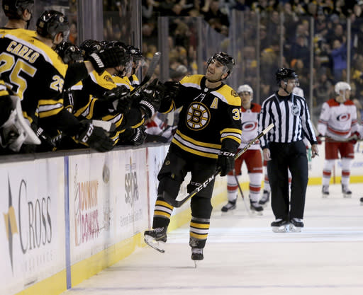 Boston Bruins center Patrice Bergeron has 32 points in 35 games after a drop in production last season. (AP Photo/Mary Schwalm)