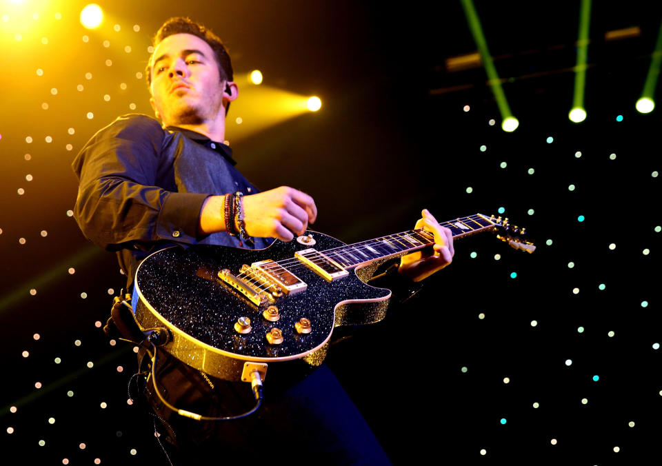 LOS ANGELES, CA - DECEMBER 01:  Musician Kevin Jonas of the Jonas Brothers performs onstage during KIIS FM's 2012 Jingle Ball at Nokia Theatre L.A. Live on December 1, 2012 in Los Angeles, California.  (Photo by Christopher Polk/Getty Images for Clear Channel)