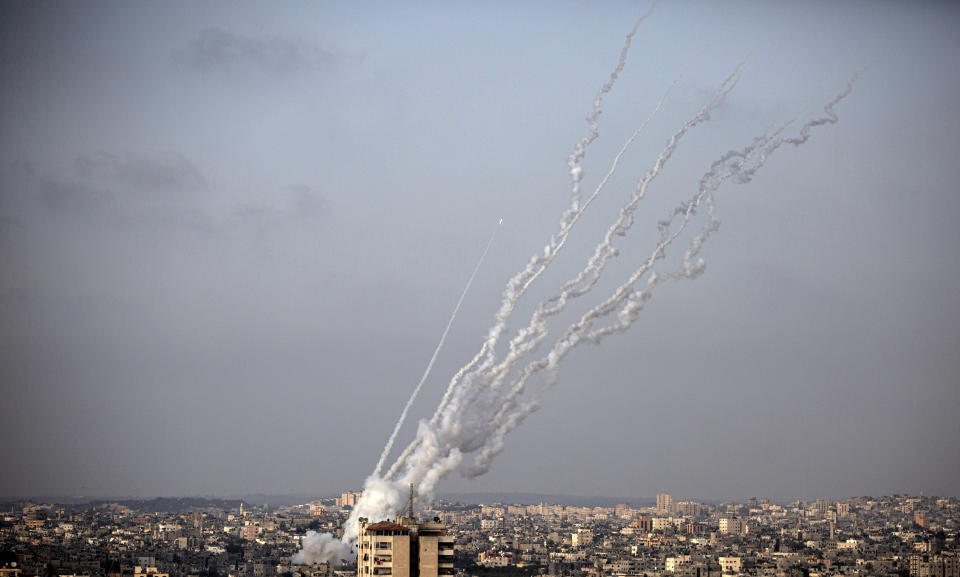 Rockets are launched from the Gaza Strip toward Israel, Monday, May. 10, 2021. (AP Photo/Khalil Hamra)