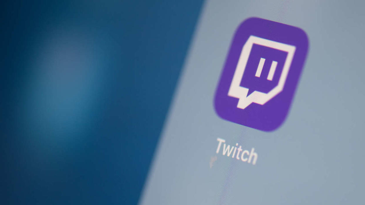 This illustration picture taken on July 24, 2019 in Paris shows the US live streaming video platform Twitch logo application on the screen of a tablet. (Photo by Martin BUREAU / AFP)