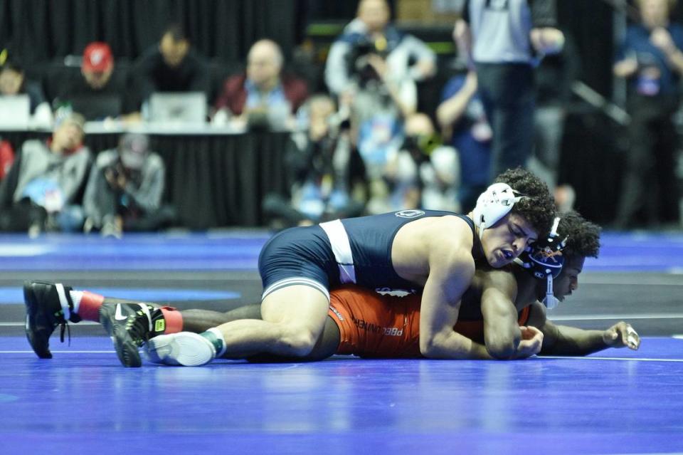 Penn State’s Beau Bartlett controls Campbell’s Shannon Hanna in their 141-pound first round match of the NCAA Championships on Thursday, March 16, 2023 at the BOK Center in Tulsa, Okla. Bartlett topped Hanna, 8-2.