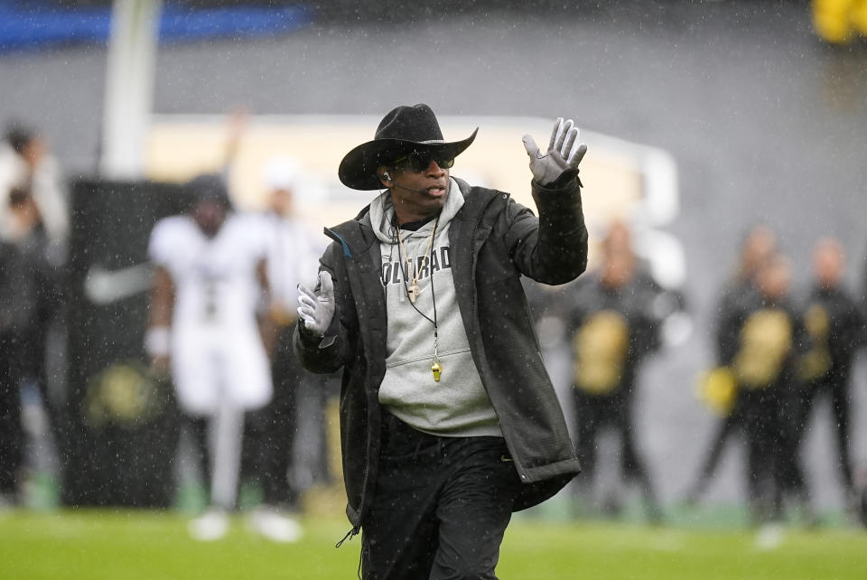 Colorado head coach Deion Sanders directs his team during the first half of an NCAA spring college football game on Saturday, April 27, 2024, in Boulder, Colorado. (AP Photo/David Zalubowski)