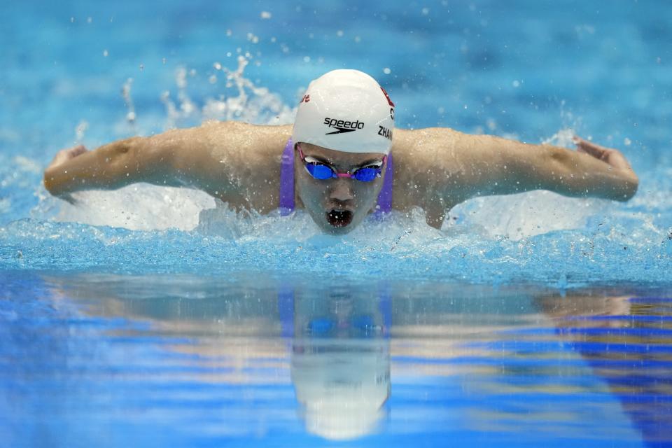 Zhang Yufei, of China, competes in the women's 100-meter butterfly final at the World Swimming Championships in Fukuoka, Japan, Monday, July 24, 2023. Zhang won gold. (AP Photo/Nick Didlick)