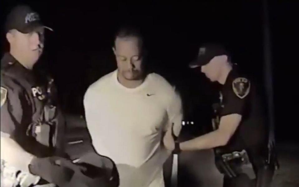 The documentary shows dashcam footage of Woods's arrest for driving under the influence in 2017 - Jupiter Police Department