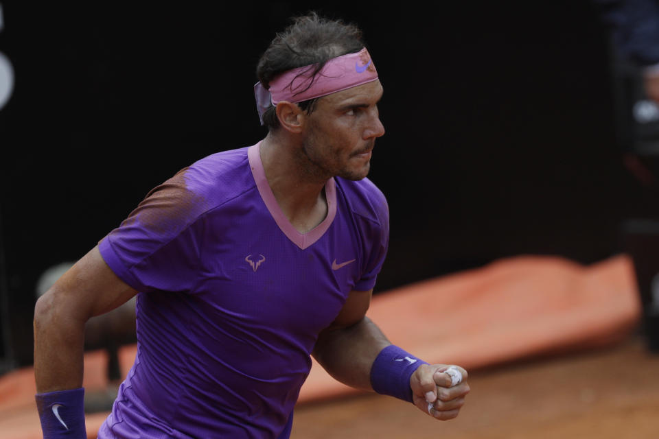 Spain's Rafael Nadal celebrates after winning a point during his quarter-final match against Germany's Alexander Zverev at the Italian Open tennis tournament, in Rome, Friday, May 14, 2021. (AP Photo/Gregorio Borgia)