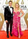 Just like at the ACM Awards in April, McLoughlin was by his wife's side (in a velvet tux!) in November 2019 at the CMA Awards in Nashville.