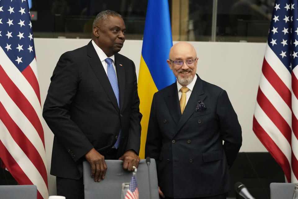 United States Secretary of Defense Lloyd Austin, left, and Ukraine's Defense Minister Oleksiy Reznikov wait for the start of a meeting of the Ukraine Defense Contact Group at NATO headquarters in Brussels, Thursday, June 15, 2023. NATO defense ministers are holding two days of meetings to discuss their support for Ukraine and ways to boost the defenses of eastern flank allies near Russia. A meeting of the Ukraine Contact Group is being held to drum up more military aid for the war-torn country. (AP Photo/Virginia Mayo)