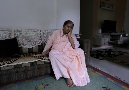 Zakia Jafri, whose late husband, a lawmaker for the Congress party which now sits in opposition, was hacked to death by a Hindu mob in riots, sits inside her son's house in Surat, India, September 15, 2015. REUTERS/Amit Dave